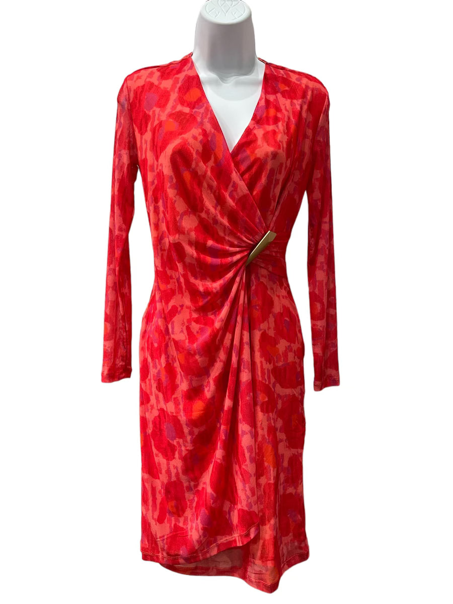 Fancy Animal Print Faux Wrap Dress. True to fit with long sleeves. Fancy brooch at the side. Fun fresh animal print.